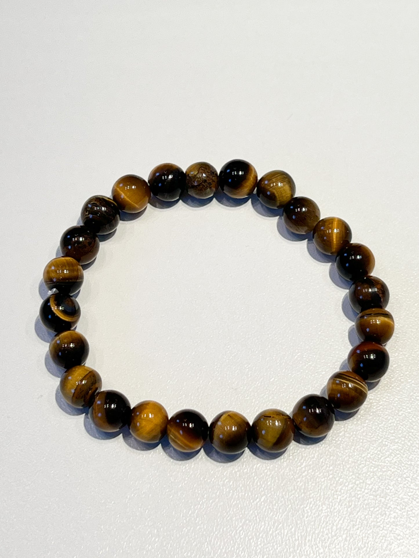 Bracelet en Œil de Tigre 8mm : Élégance et Protection au Quotidien