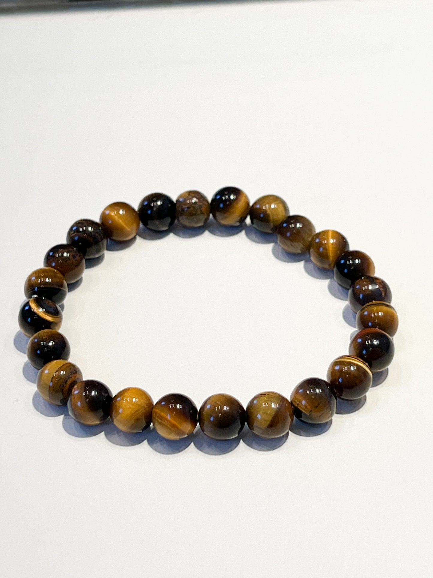 Bracelet en Œil de Tigre 8mm : Élégance et Protection au Quotidien