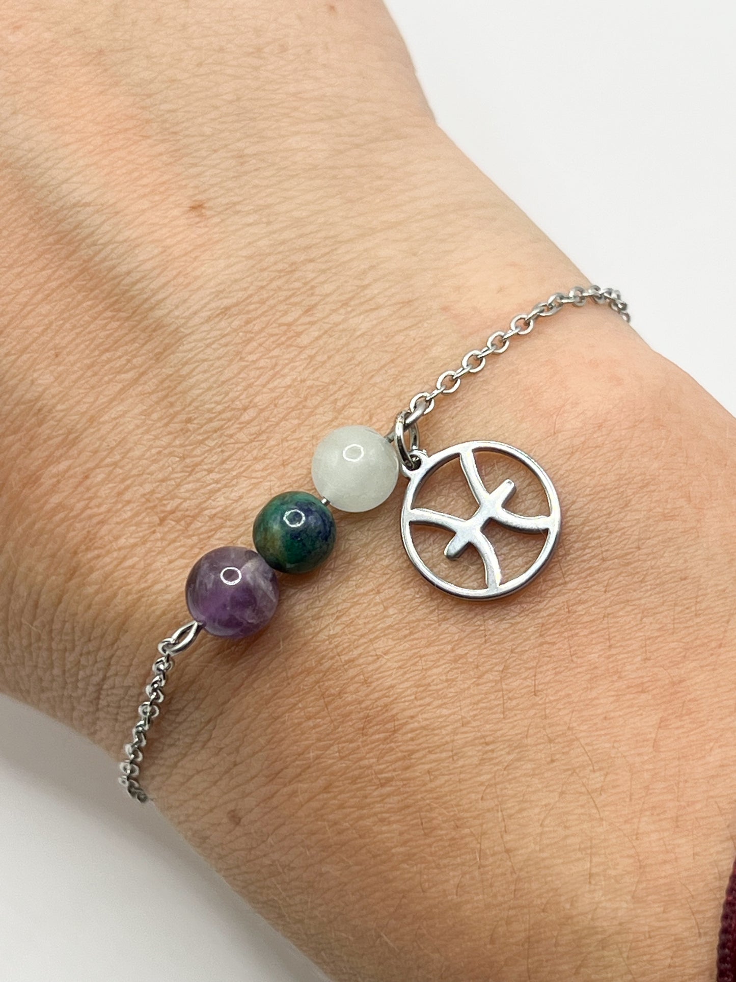 Bracelet Astro Poissons en Acier Inoxydable Argenté – Élégance et Protection